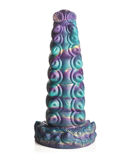 The Creature Cocks Chrysalis in front of a plain white background. The tip of the dildo looks like it's the caterpillar's eyeballs. | Kinkly Shop