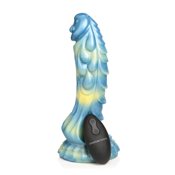 Creature Cocks Sea Stallion with Remote with the remote leaning against the shaft. | Kinkly Shop