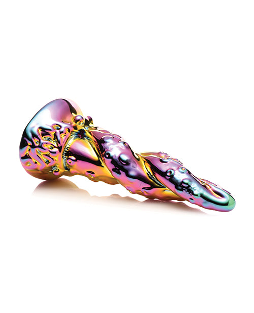 The Creature Cocks Enchantress laying on its side. It does not bend in the slightest as it's made from glass. It looks very firm and rigid. | Kinkly Shop