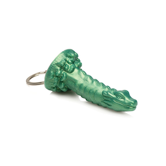 Close-up on the tip of the Creature Cocks Cockness Monster Key Chain showcasing the adorable little "monster" face that's at the end of it | Kinkly Shop