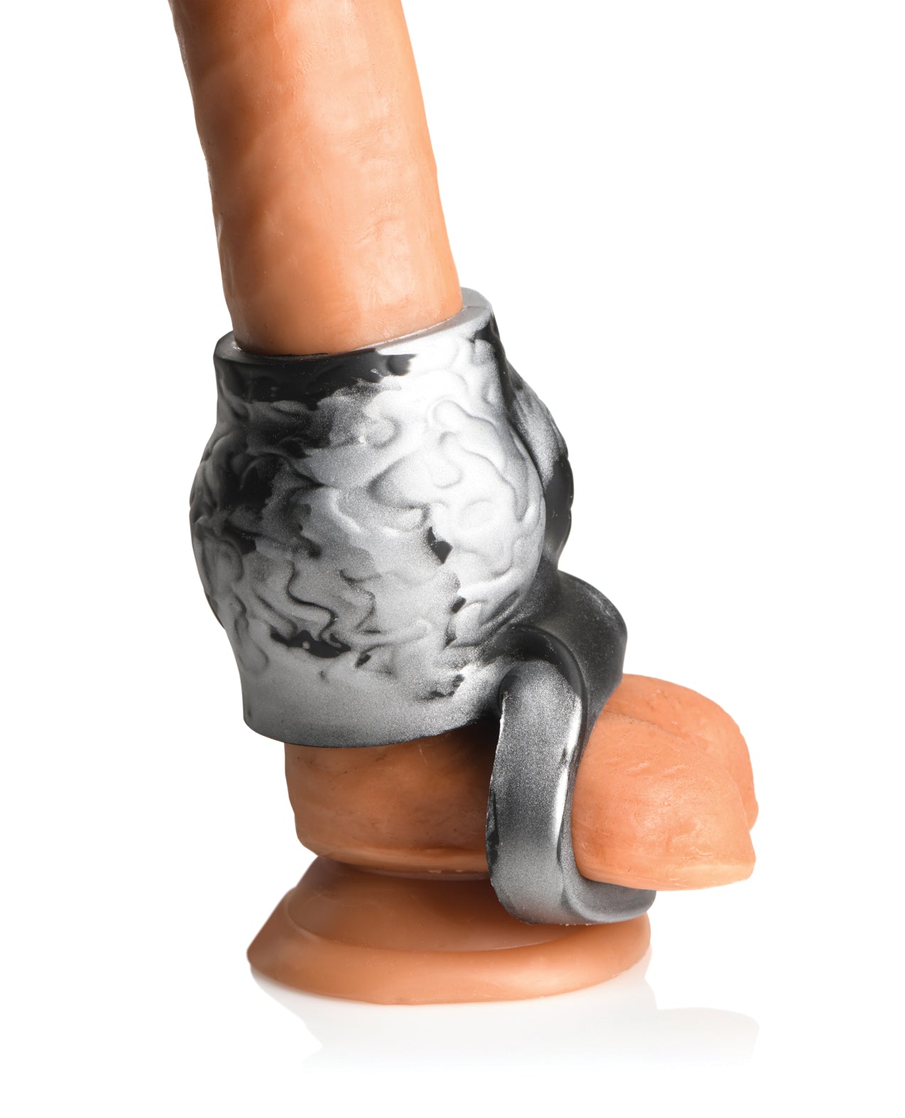 The Creature Cocks Night Prowler Sleeve being worn on a realistic dildo. It adds a lot of thickness to the base of the penis with a strap that anchors the knot around the testicles to keep it in place. | Kinkly SHop