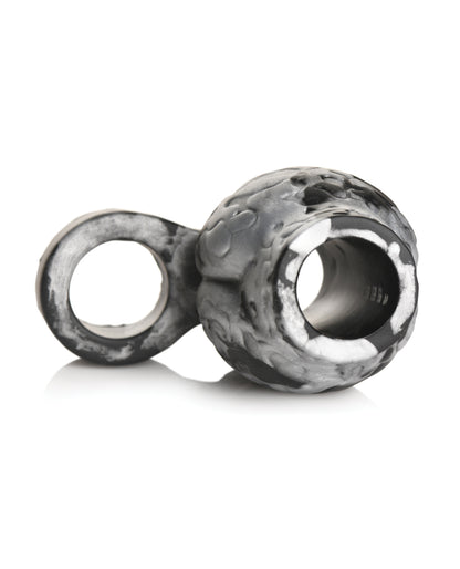 See-through the Creature Cocks Night Prowler Sleeve with the two holes in the cock sleeve. One hole is used for the shaft while the other hole wraps around the testicles to anchor the sleeve in place. | Kinkly Shop