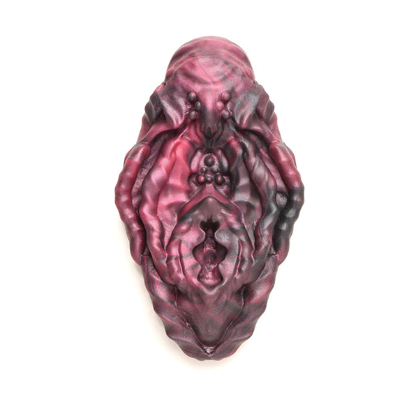 The Creature Cocks Xeno Grinder in front of a plain white background | Kinkly Shop