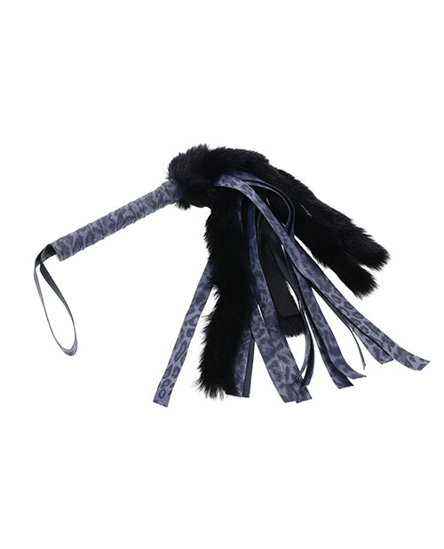 The handle of the Sportsheets Cougar Faux Fur Flogger is covered in color-matching cougar material that matches the tails of the flogger. | Kinkly Shop