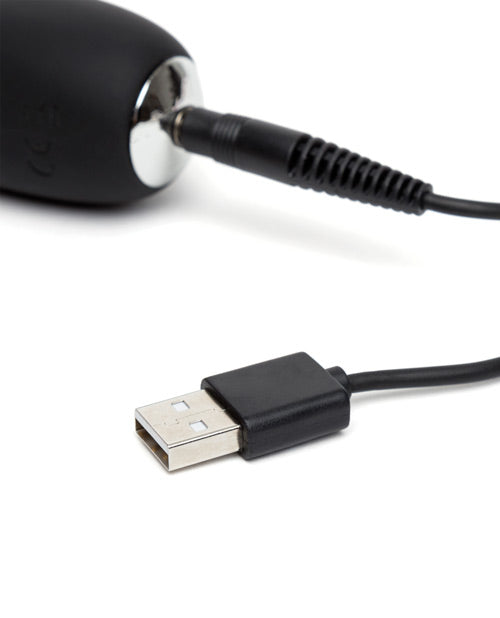 Close-up of the charging cable which is a pin-style charger that plugs into the base of the Happy Rabbit Slimline G-spot | Kinkly Shop