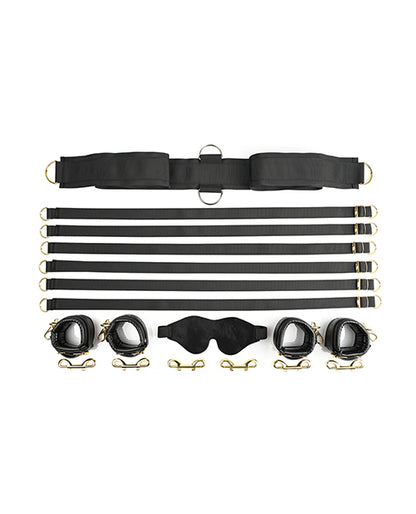 Everything included with the Sportsheets Under The Bed Restraint System - Special Edition. This includes the center, under-the-bed trap, six tethers, four faux leather, cuffs, six double-ended gold clips, and a velvet blindfold. | Kinkly Shop