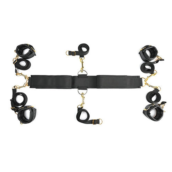 The Sportsheets Under The Bed Restraint System - Special Edition laid flat in front of a plain white background, showcasing the design of the full six bondage straps. | Kinkly Shop