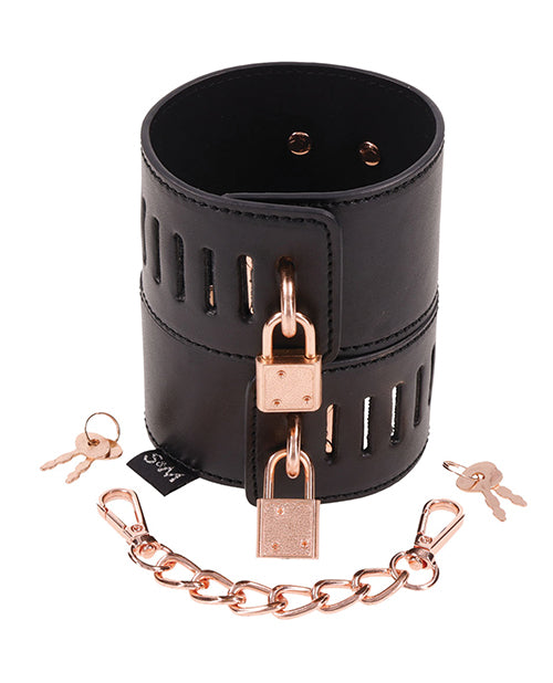 The Sportsheets Brat Locking Cuffs stacked on top of one another. | Kinkly Shop