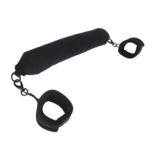 The Sportsheets Pivot Positioning Bar in front of a plain white background. It looks like a soft, long cushion with two cuffs attached on either end. The cuffs can easily be removed from the soft, long cushion if desired. | Kinkly Shop