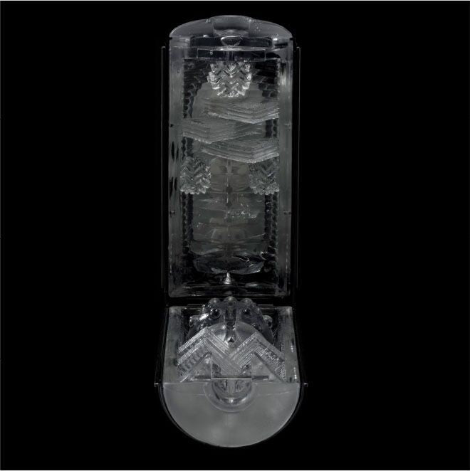 The Tenga Flip Hole in Black opened up to showcase the depth and variety of the textures inside of the stroker. There's a lot of variety, protrusions, and depth to the textures. | Kinkly Shop