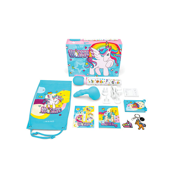 Everything included in the Le Wand Unicorn Wand Set. There's the drawstring backpack, the included attachment, the stickers, the postcard, the keychain, the instruction manual, the wand itself, and the charger with multiple electrical plates to work with different regions. | Kinkly Shop