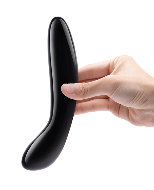 A hand holds the Le Wand Crystal G in Black | Kinkly Shop