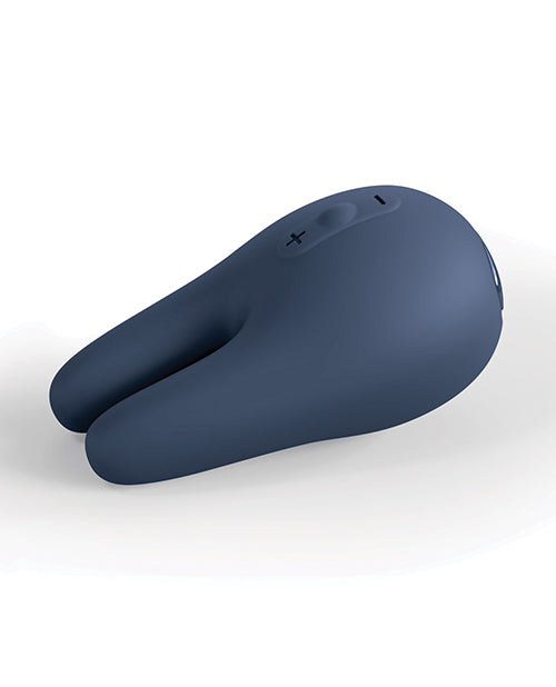 The Jimmyjane Form 2 Pro lays on its side. This showcases how thick the "handle" and base of the vibrator is while it slims and becomes lighter near the tip of the two vibrating prongs. | Kinkly Shop