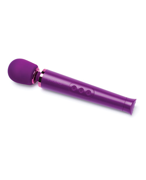 The Le Wand Petite Rechargeable in Cherry laying out flat on a white surface. This top-down view showcases the 3 individual buttons on the handle that make it easy to control the vibrations. | Kinkly Shop