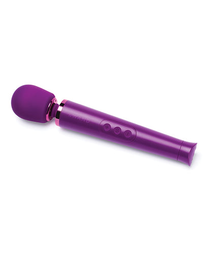 The Le Wand Petite Rechargeable in Cherry laying out flat on a white surface. This top-down view showcases the 3 individual buttons on the handle that make it easy to control the vibrations. | Kinkly Shop
