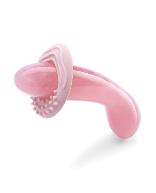 The Le Wand Crystal G in Rose shown with the optional, included silicone texture ring shown at one end. This textured silicone ring adds external stimulation at the entrance when fully inserting the dildo. | Kinkly Shop