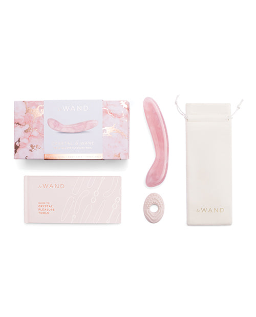 Everything included in the Le Wand Crystal G kit including a guide to using crystal delights, a drawstring storage bag, the dildo, and an optional silicone textured ring. | Kinkly Shop