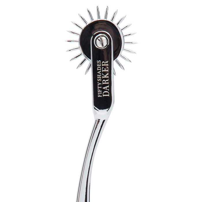 Close-up on the pinwheel tip of the Fifty Shades "Adrenaline Spikes" Pinwheel really shows off the "Fifty Shades Darker" text that's been emblazoned on the toy | Kinkly Shop