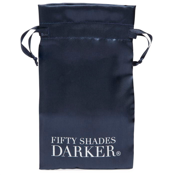 The included storage bag. It's black but has the gigantic words "Fifty Shades Darker" printed on it. | Kinkly Shop