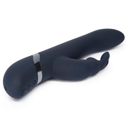 Close-up on the base of the Fifty Shades Darker: Oh My shows the curved base design that will not allow the vibrator to sit upright. It also looks like it has a pin-style charging port at the base. | Kinkly Shop