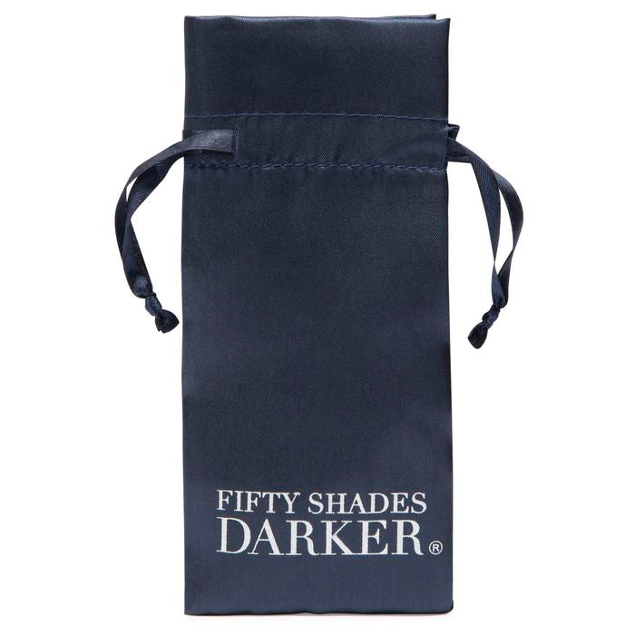 The included drawstring storage bag for the Fifty Shades "At My Mercy". The bag says "FIfty Shades Darker" In gigantic letters, and it would not be a discreet way to store the clamps. | Kinkly Shop