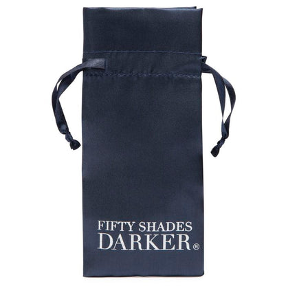 The included drawstring storage bag for the Fifty Shades "At My Mercy". The bag says "FIfty Shades Darker" In gigantic letters, and it would not be a discreet way to store the clamps. | Kinkly Shop