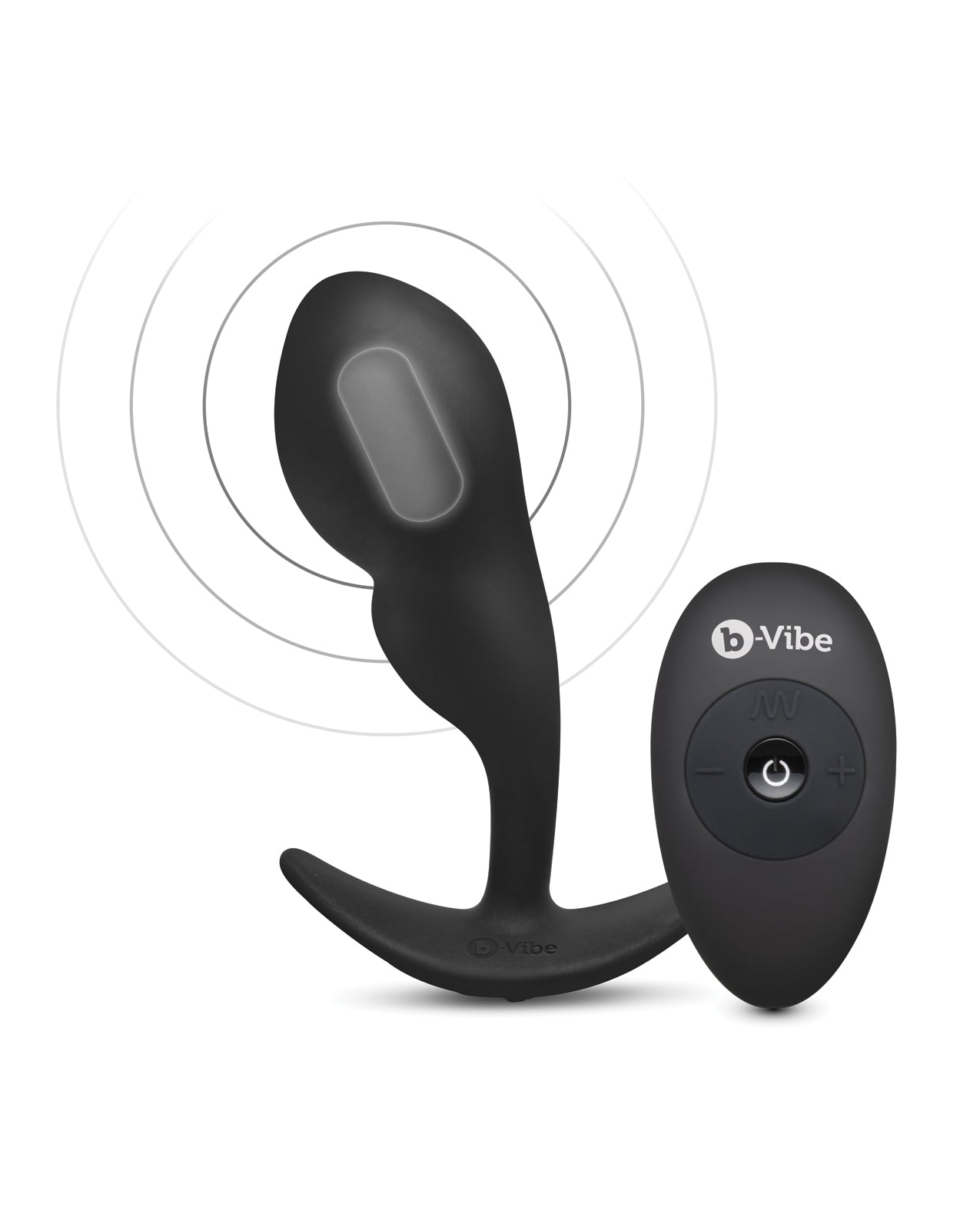 An X-ray vision of the B-Vibe Remote Control P-Spot Snug Plug showcases the vibrating motor inside of the tip of the prostate plug. A small oval-shaped remote nearby showcases that the toy is wirelessly remote controlled. | Kinkly Shop