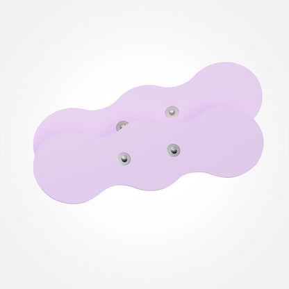 The snap-on design of the replaceable electrode pads for the VUSH Aura Wireless TENS Device | Kinkly Shop