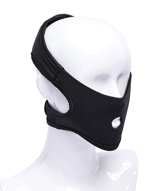 A mannequin head wears the Pivot In Your Face Strap-On. The strap-on harness has two behind-the-head straps to support the weight of the dildo in the front. | Kinkly Shop
