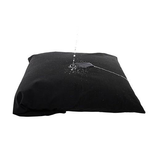 Someone pours water on the Sportsheets Pillow Protector. It appears to splash off the waterproof pillow protector. | Kinkly Shop