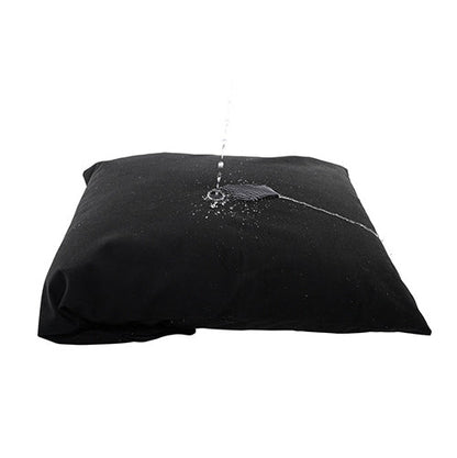 Someone pours water on the Sportsheets Pillow Protector. It appears to splash off the waterproof pillow protector. | Kinkly Shop