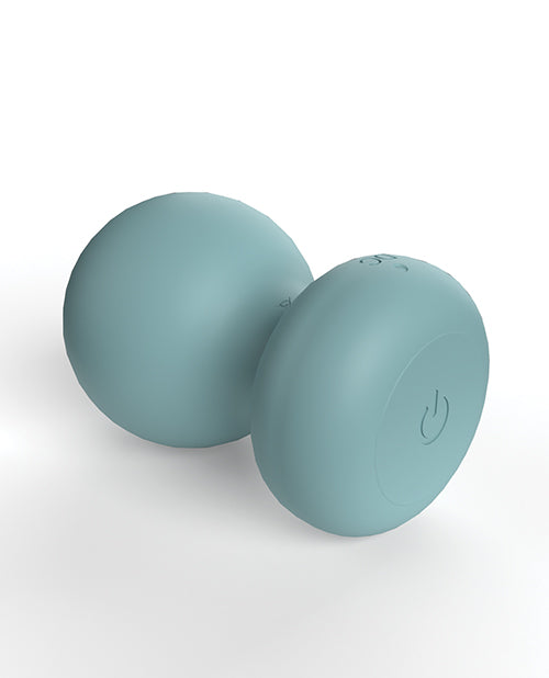 The Screaming O Cuties Palmy lays on its side. The single power/control button on the base is very visible from this angle. | Kinkly Shop
