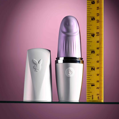 The Playboy Getaway shown next to a yellow measuring tape. The vibrator is bout 5.25" long with the lid on. | Kinkly Shop