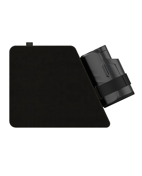 Side view of the KIIROO KEON Accessory: Multifunctional Pillow with the KEON strapped onto it. The pillow is very large compared to the KEON, offering a good counterpoint for the size of the KEON | Kinkly Shop