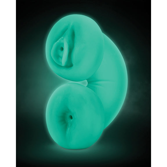 The Blush Double Trouble Glow in the Dark shown in the dark, shining with its glow in the dark design. It looks green in the dark | Kinkly