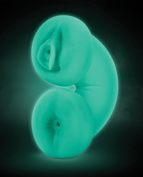 The Blush Double Trouble Glow in the Dark shown in the dark, shining with its glow in the dark design. It looks green in the dark | Kinkly