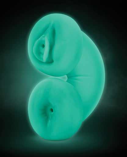The Blush Double Trouble Glow in the Dark shown in the dark, shining with its glow in the dark design. It looks green in the dark | Kinkly