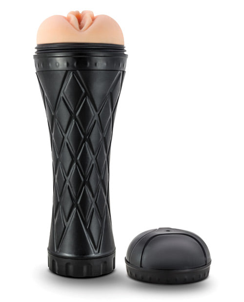 The Blush Torch stands upright with the pussy orifice visible from the top of the plastic case of the stroker. | Kinkly Shop