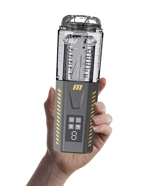A hand holds the SpinMaster Pro. The stroker looks like it fits comfortably into their hand, but the stroker is much longer than their hand. | Kinkly Shop