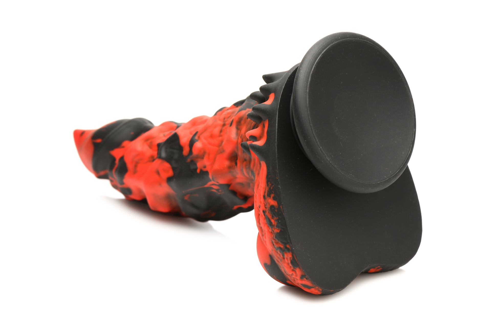 Close up on the base of the Creature Cocks Fire Demon. The dildo has a large suction cup attached to the base for hands-free play. | Kinkly Shop