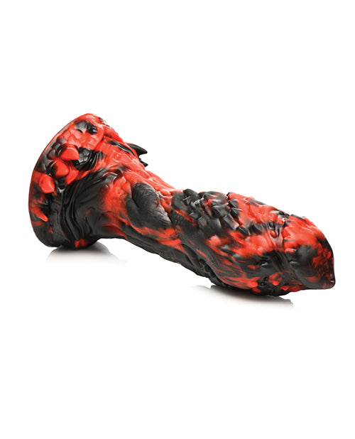 The Creature Cocks Reaper lays on its side. The dildo has an intense amount of texture on it. | Kinkly Shop