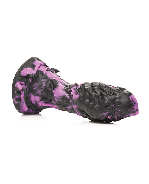 The Creature Cocks Grim dildo laying on its side. The dildo is firm enough to hold its shape. | Kinkly Shop