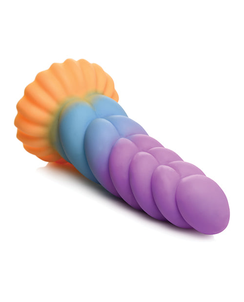The Creature Cocks Unicorn lays on a flat surface. The rippling texture is very deep. | Kinkly Shop