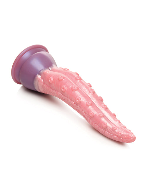The Creature Cocks Octoprobe lays out sideways, showcasing that the dildo holds its shape even when laid sideways. | Kinkly Shop