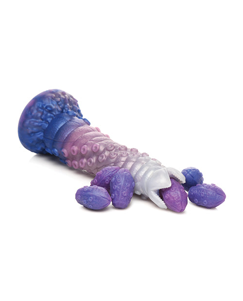 The Creature Cocks Tenta-Queen Ovipositor laying flat with its eggs near it. | Kinkly Shop