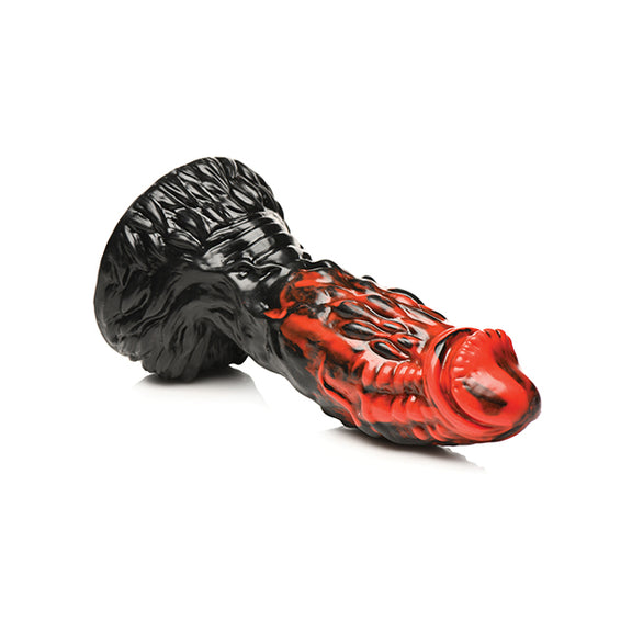 The Creature Cocks Vulcan Rod lays on its side. The "red" silicone coloration starts at the tip and looks like it "drips" down the shaft. | Kinkly Shop
