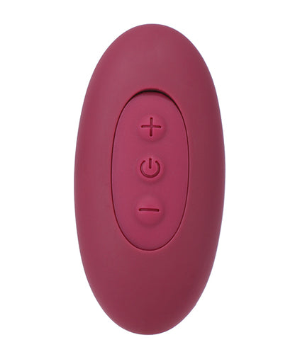 Close-up on the remote for the Tryst Duet. The wireless remote has three buttons on it. | Kinkly Shop