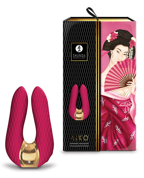 The Shunga Aiko in raspberry shown next to the packaging for the toy | Kinkly Shop