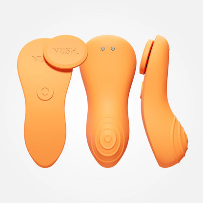The VUSH Luna shown in front of a plain background. The vibrator uses a magnet to fasten the toy to any pair of undies. It also has a somewhat protruding design to better hit the clitoris with a ribbed, wave-like texture for added stimulation. | Kinkly