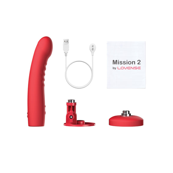 Everything included with the Lovense Mission 2 which includes the vibrating dildo itself, the two pieces that make up the suction cup base, the charging cable, and the instruction booklet. | Kinkly